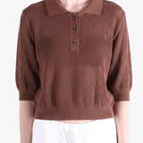 Brown shirt worn by a person, showing the shirt fit