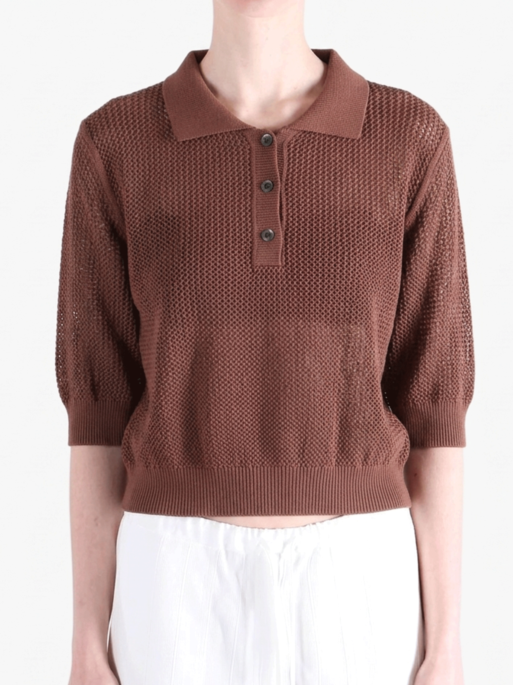 Brown shirt worn by a person, showing the shirt fit