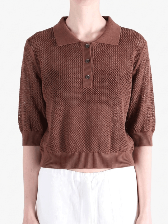 Brown shirt worn by a person, showing the shirt fit