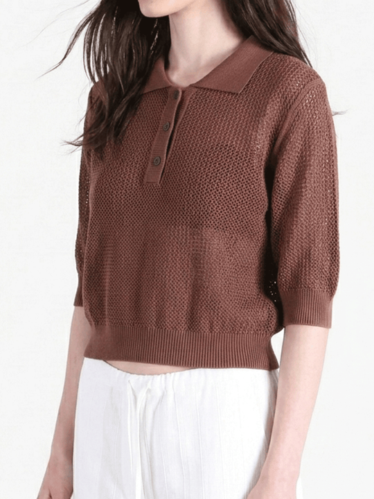 Brown shirt worn by a person, side view