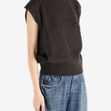 Brown tops worn by a person, showing the tops fit