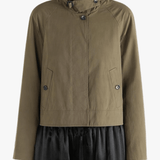 Tan jacket worn by a person, showing the jacket's fit