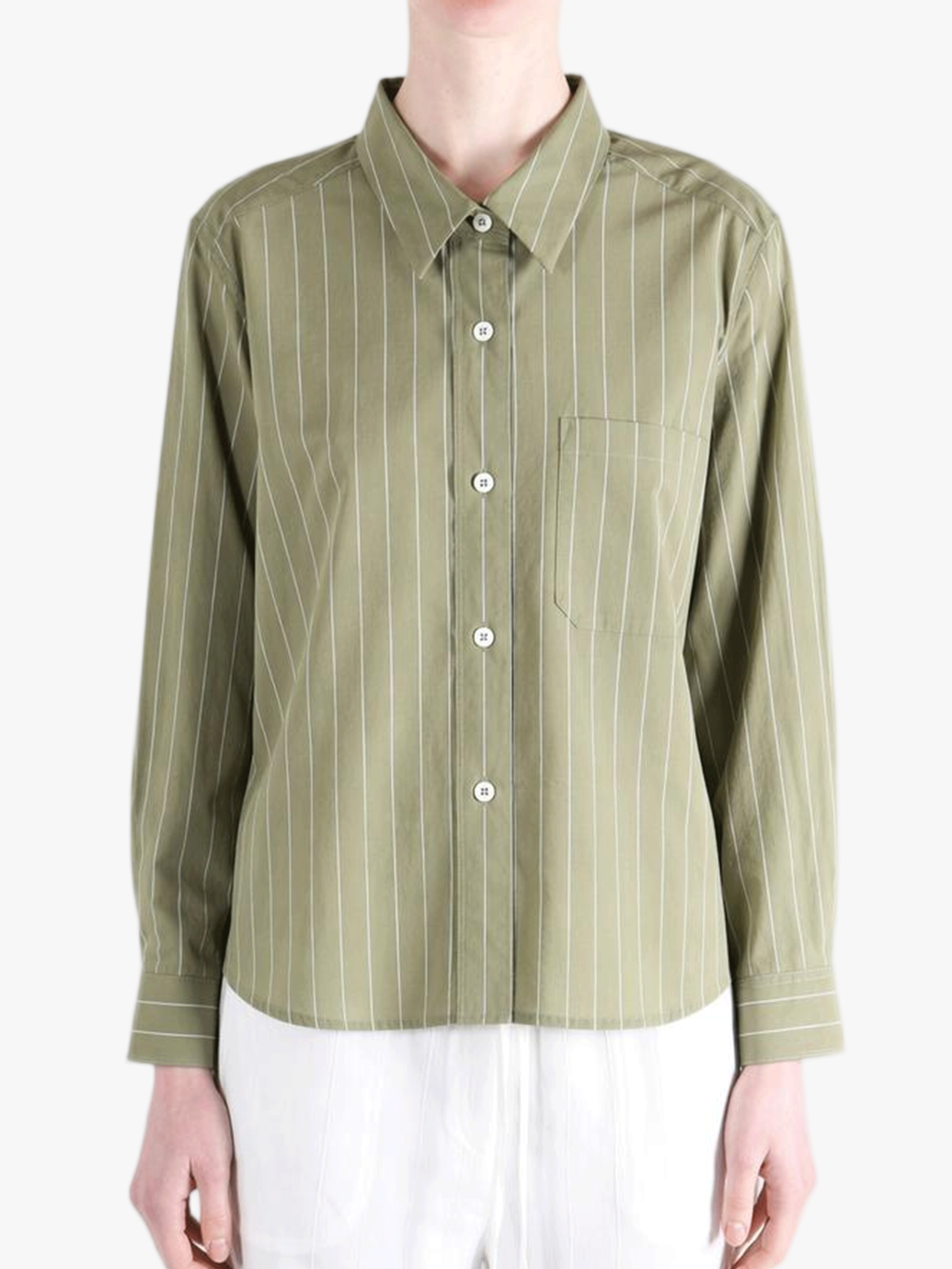 Green shirts worn by a person, showing the shirts's fit