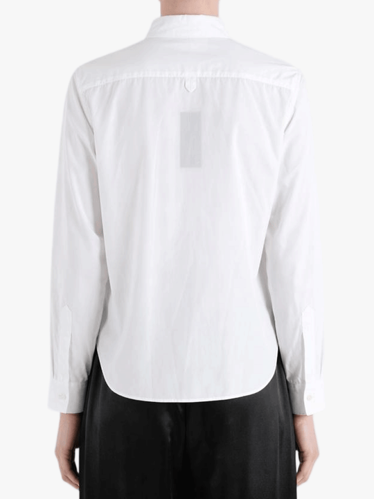 White shirt worn by a person, back view