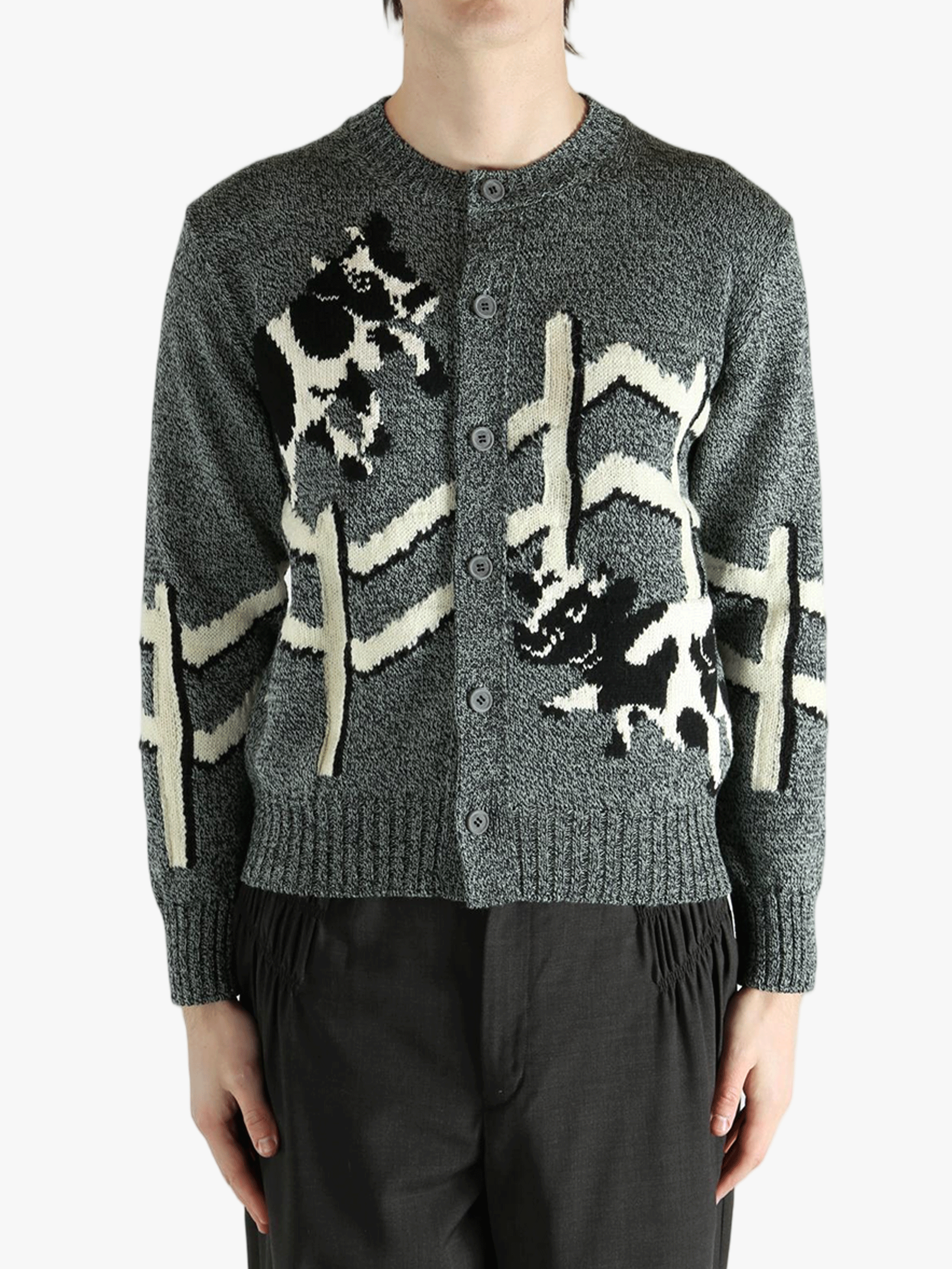  gray sweater worn by a person, showing the sweater  fit