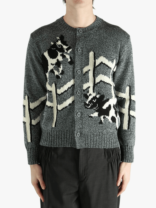  gray sweater worn by a person, showing the sweater  fit