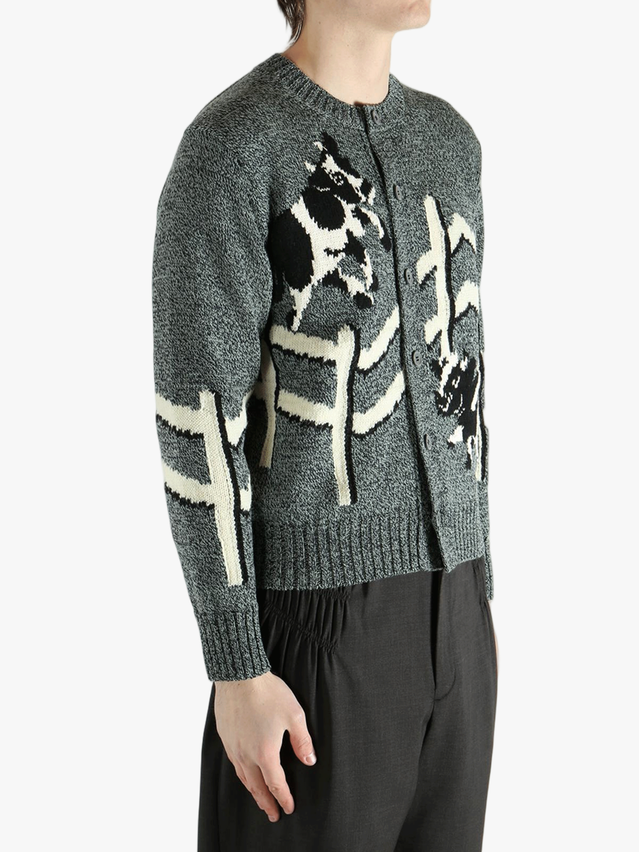  gray sweater worn by a person, showing the sweater  fit