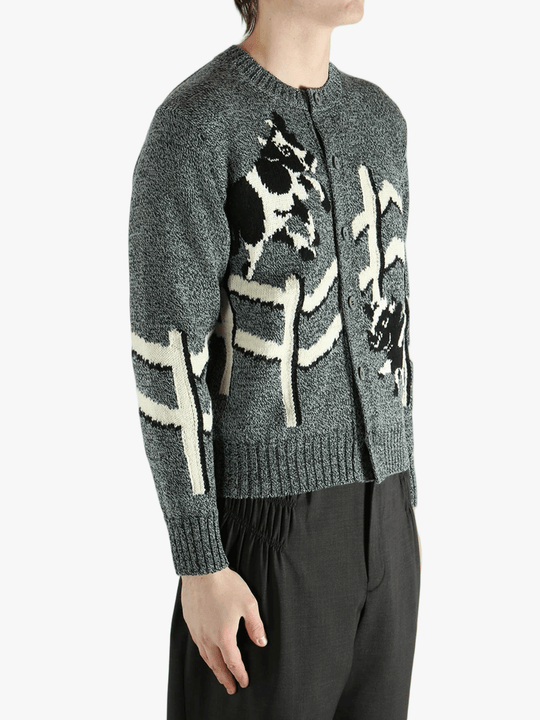  gray sweater worn by a person, showing the sweater  fit