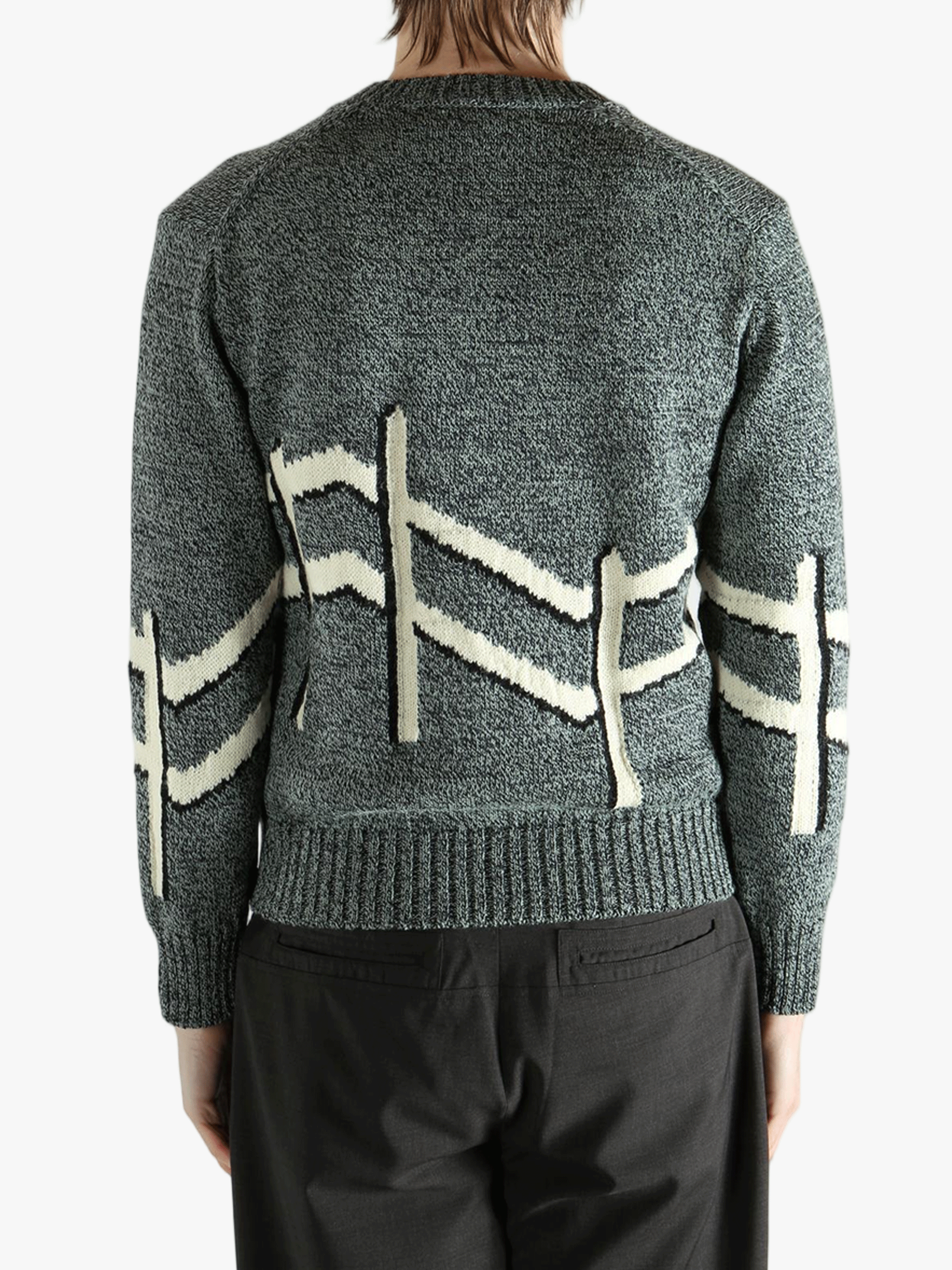  gray sweater worn by a person, showing the sweater  fit