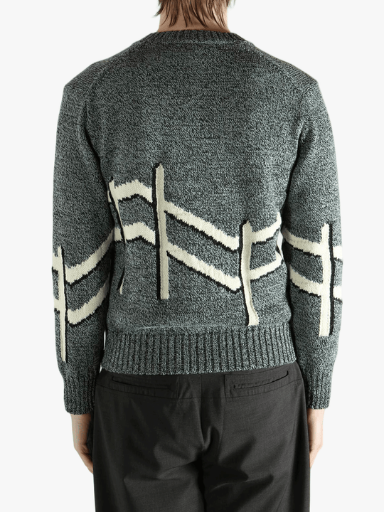  gray sweater worn by a person, showing the sweater  fit