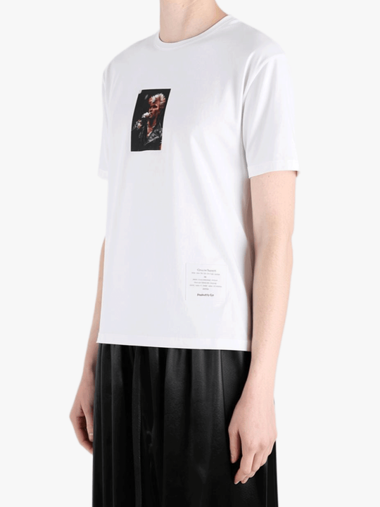 White t-shirt worn by a person, showing the t-shirt fit