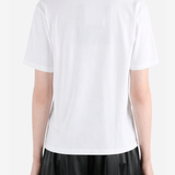 White t-shirt worn by a person, showing the t-shirt fit
