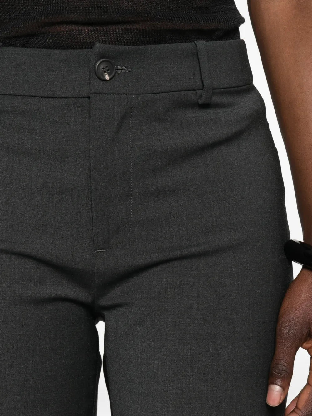 Grey shorts worn by a person, showing the shorts fit