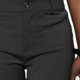 Grey shorts worn by a person, showing the shorts fit