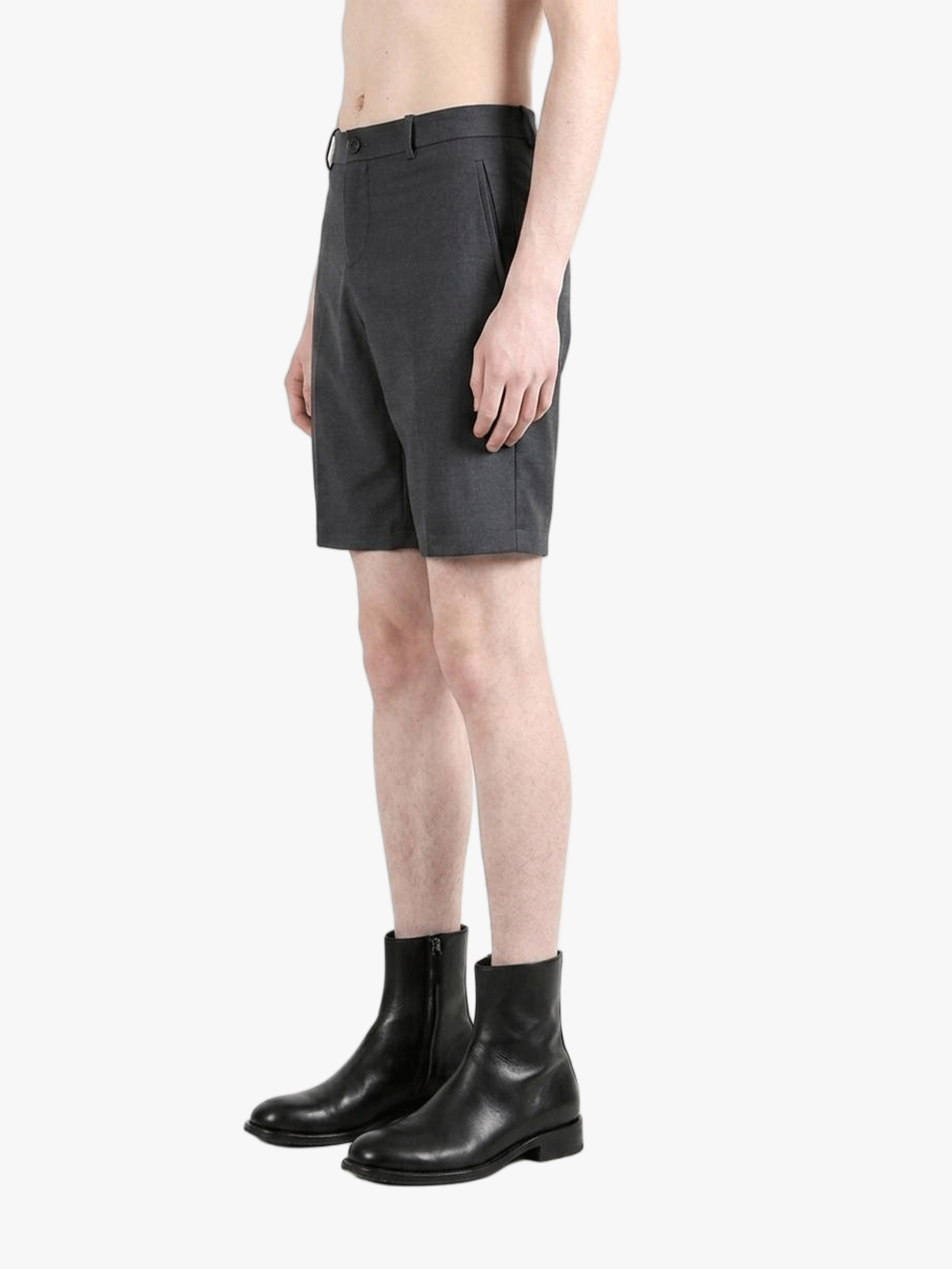 Grey pants worn by a person, side view