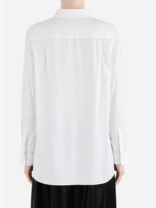 White shirt worn by a person, back view