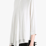 White shirt worn by a person, side view