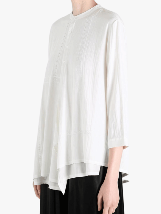 White shirt worn by a person, side view