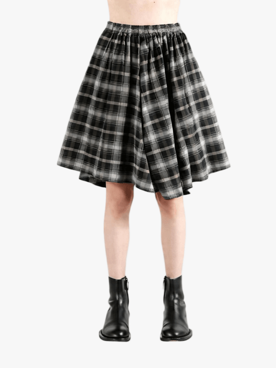 Black pants worn by a person, showing the pants fit