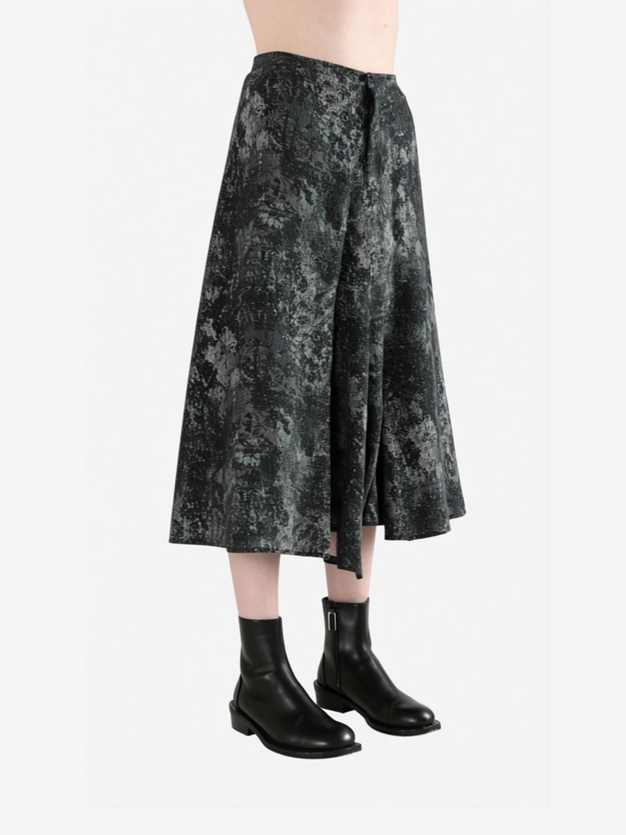 Green pants worn by a person, side view