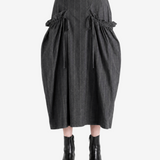 Grey skirt worn by a person, showing the skirt fit