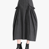 Grey skirt worn by a person, showing the skirt fit