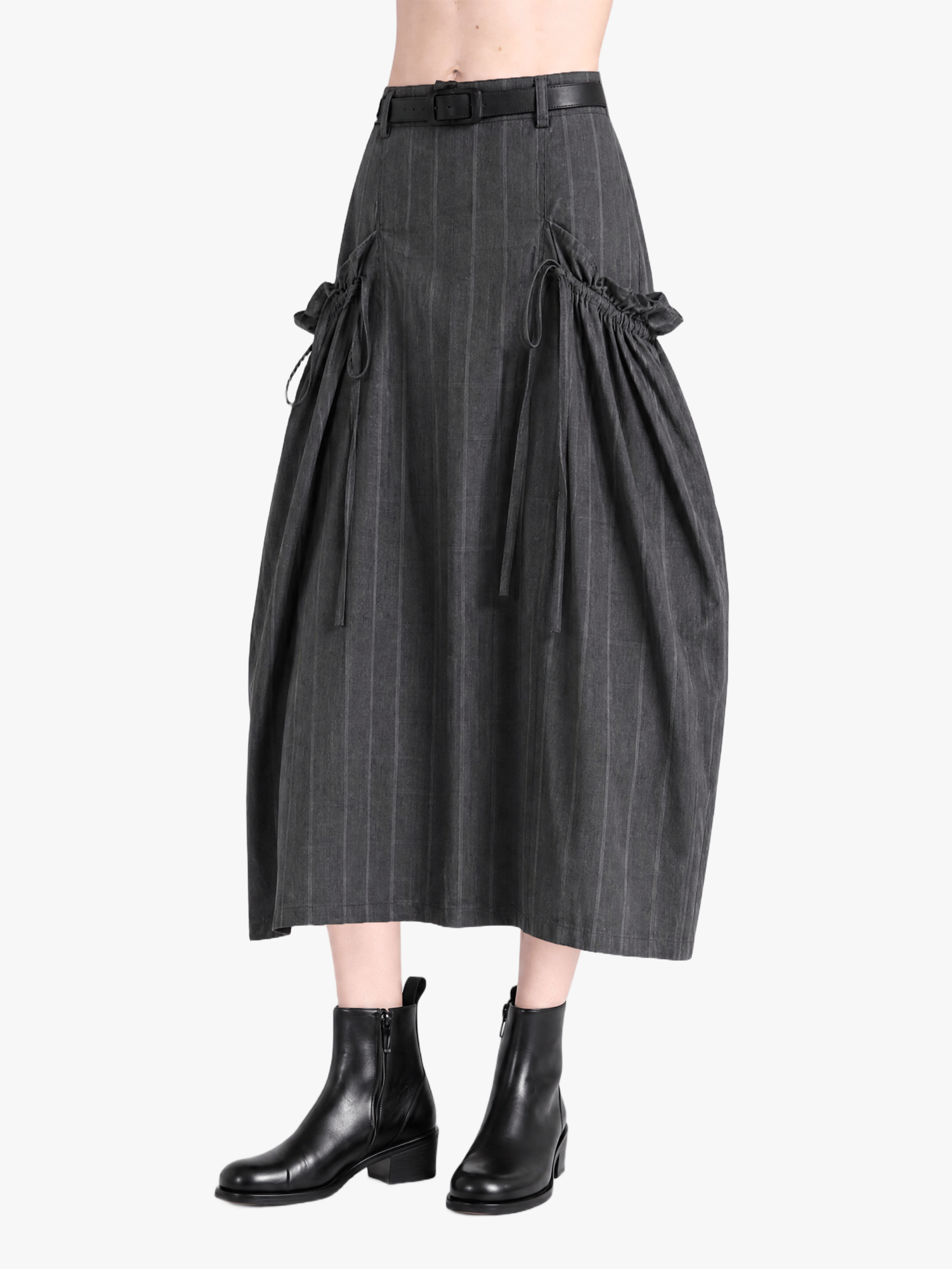 Grey skirt worn by a person, showing the skirt fit