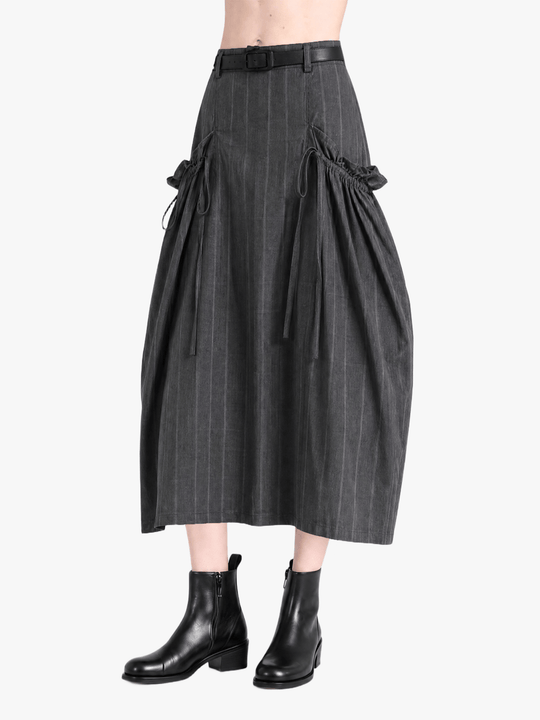Grey skirt worn by a person, showing the skirt fit