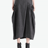 Grey skirt worn by a person, showing the skirt fit