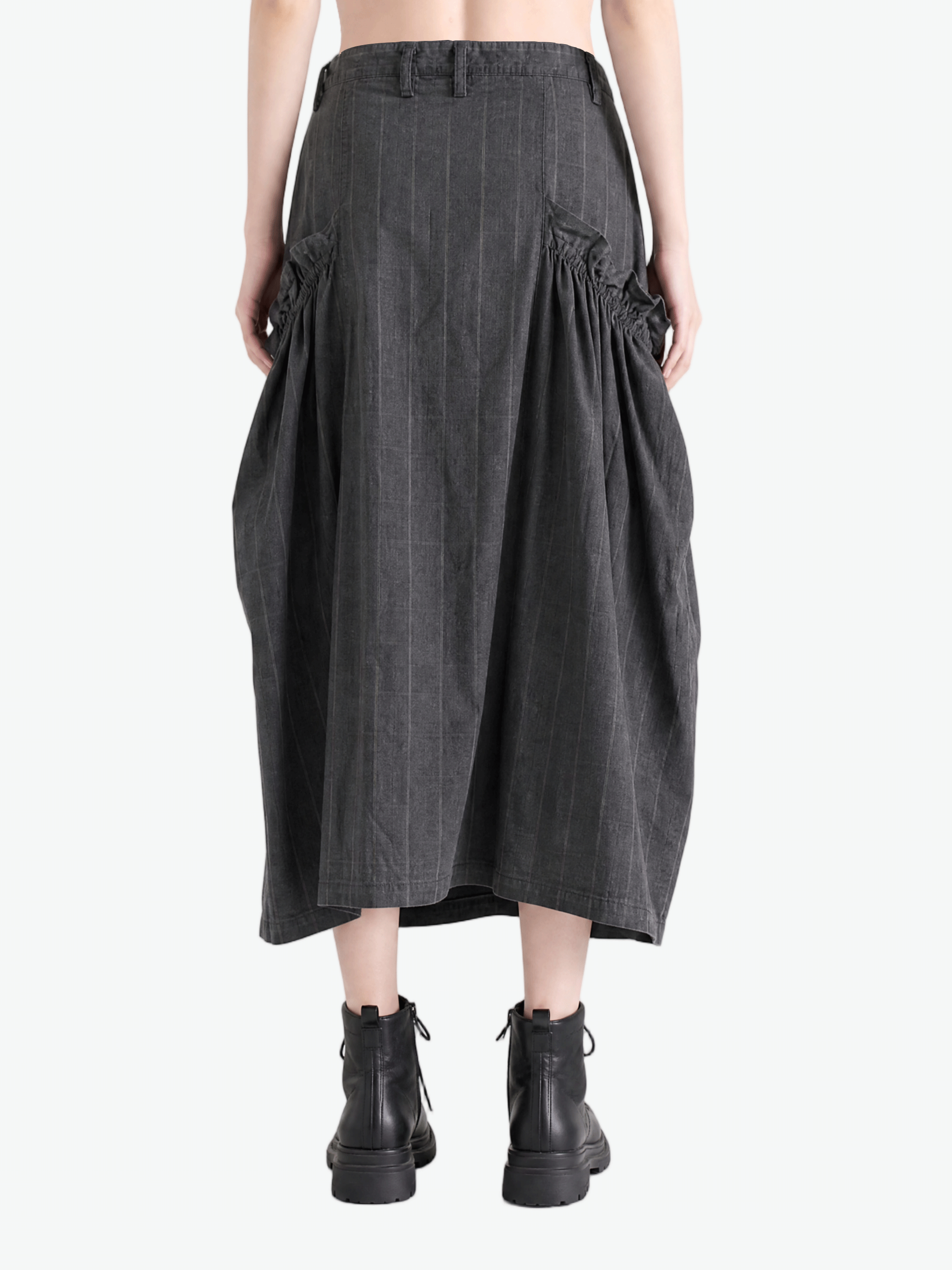 Grey skirt worn by a person, showing the skirt fit