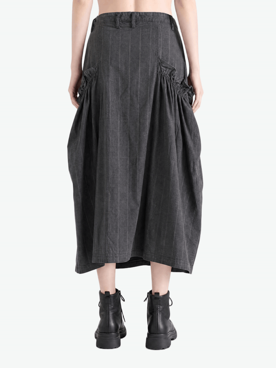 Grey skirt worn by a person, showing the skirt fit