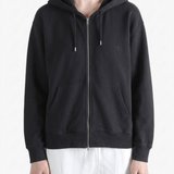 Black hoodies worn by a person, showing the hoodies fit