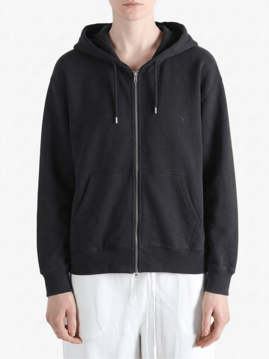 Black hoodies worn by a person, showing the hoodies fit