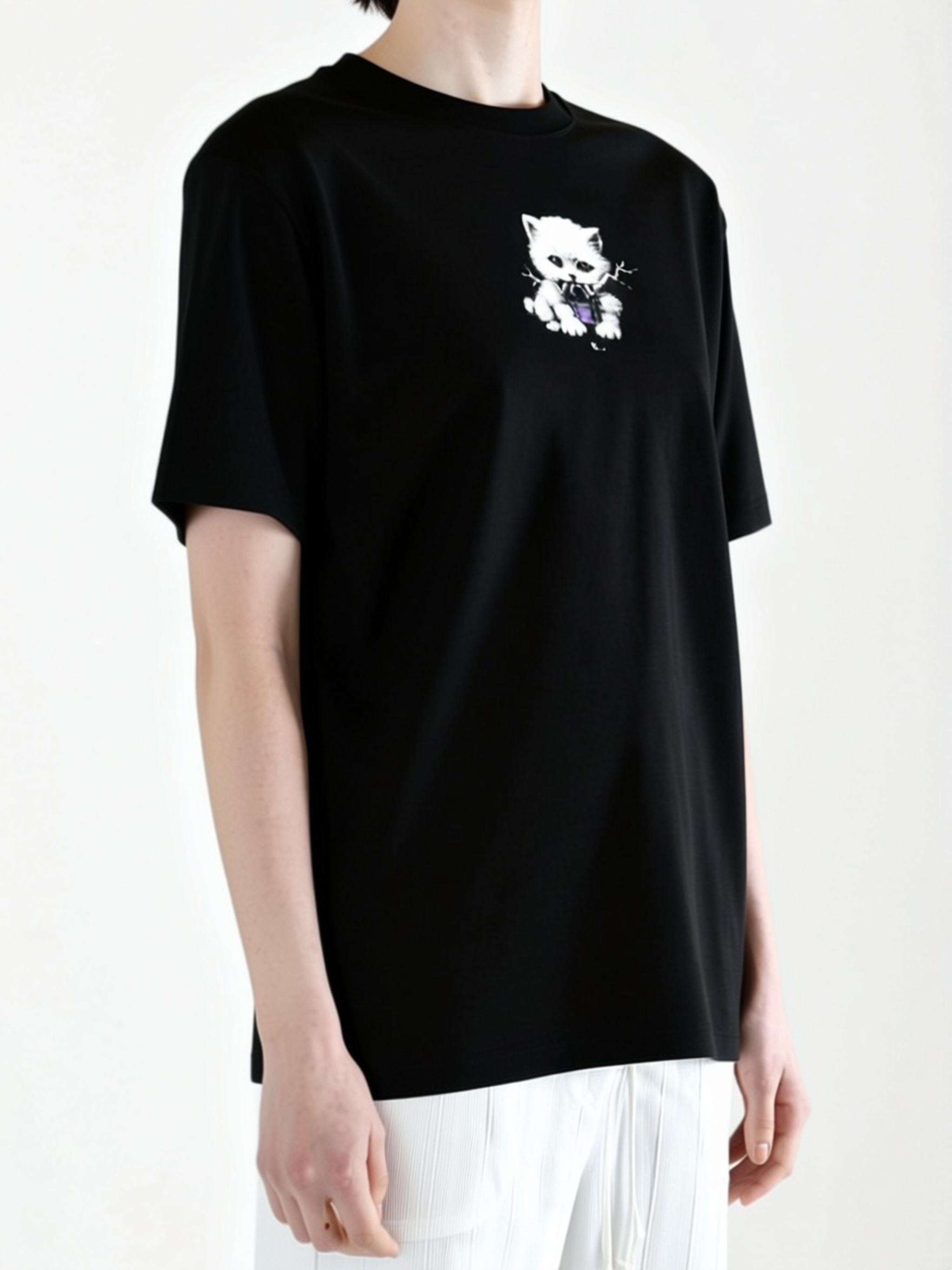 Black top worn by a person, side view