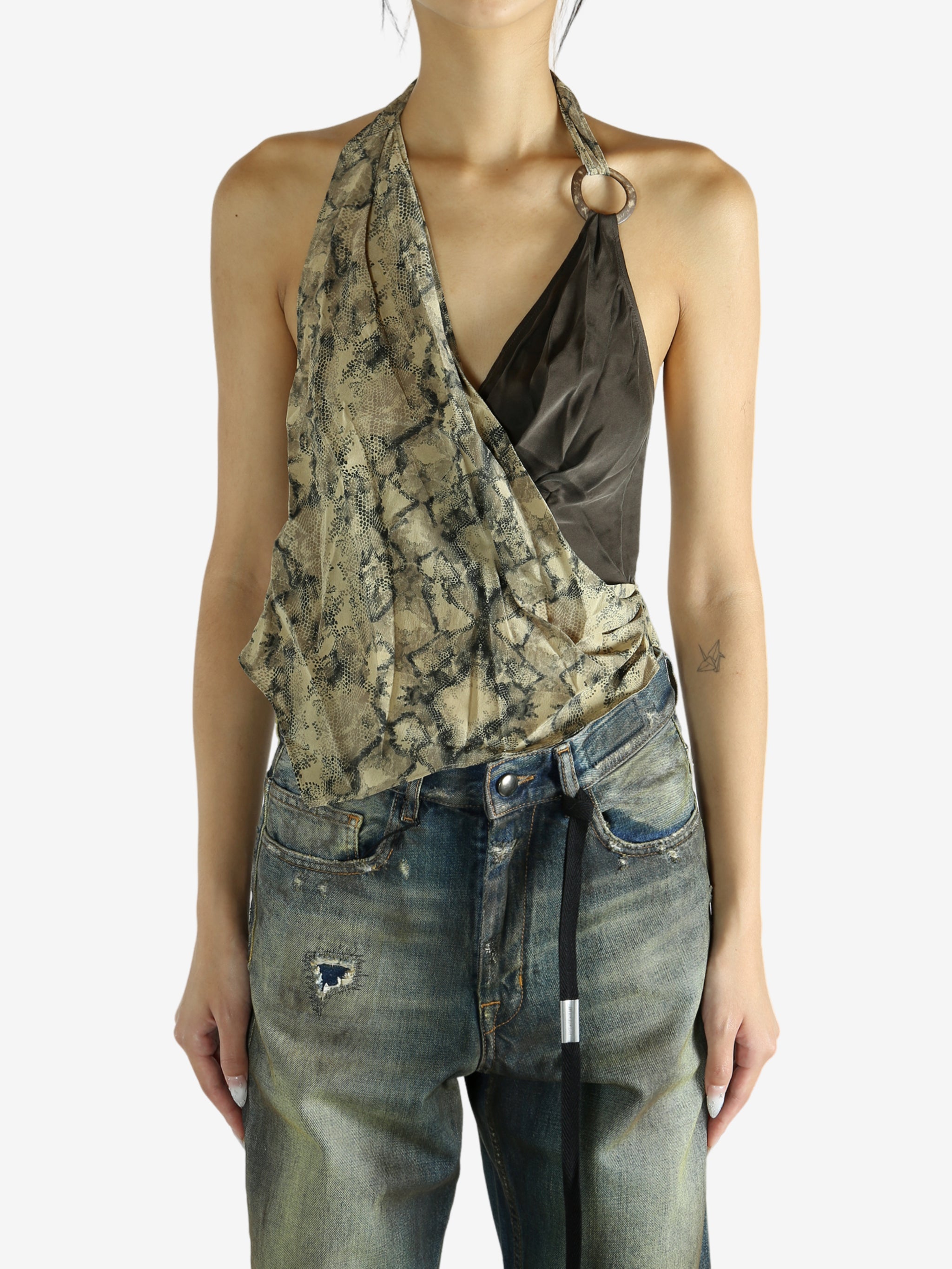 green tops worn by a person, showing the tops fit