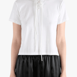 White shirts worn by a person, showing the shirts fit