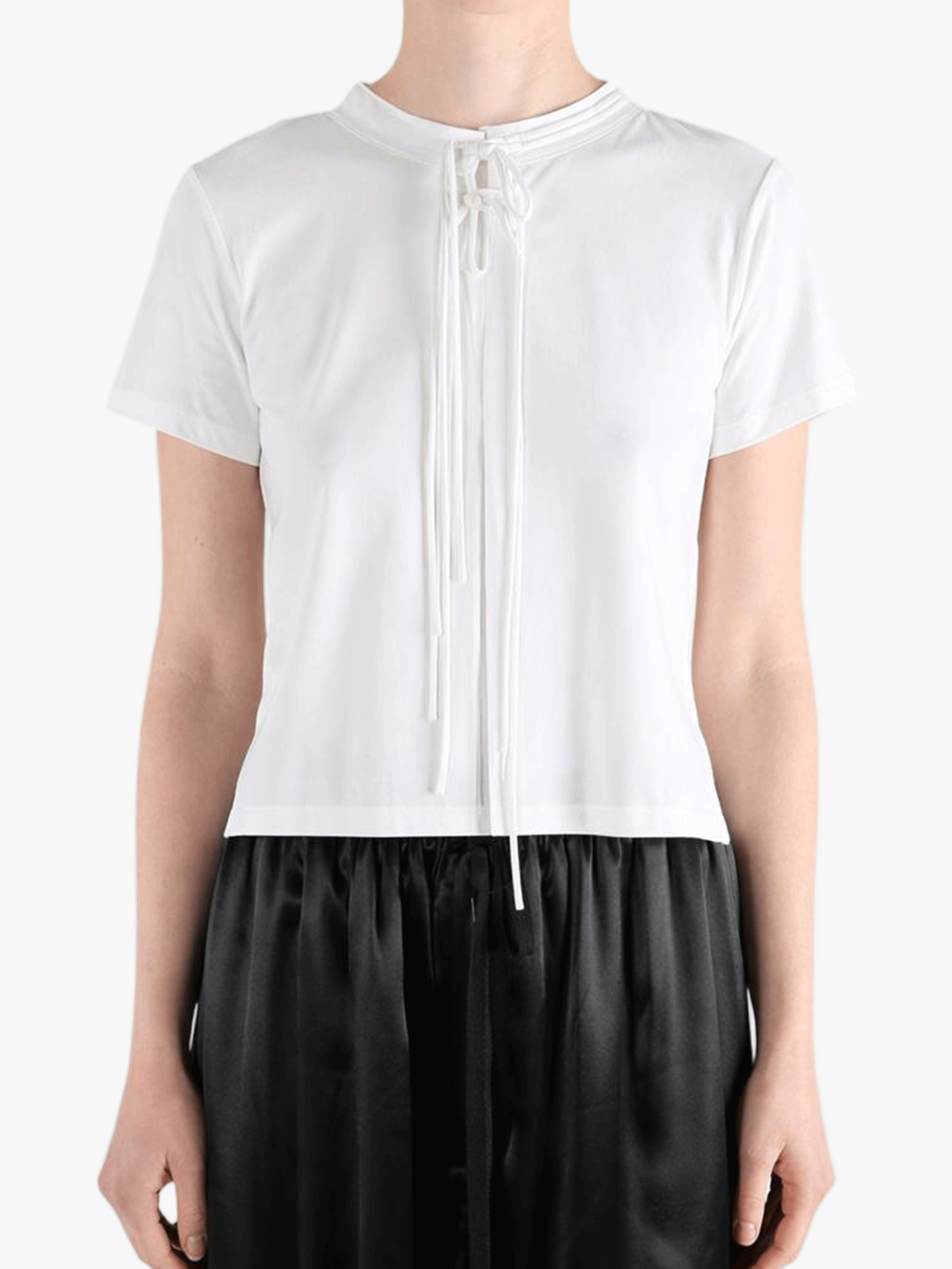 White shirts worn by a person, showing the shirts fit