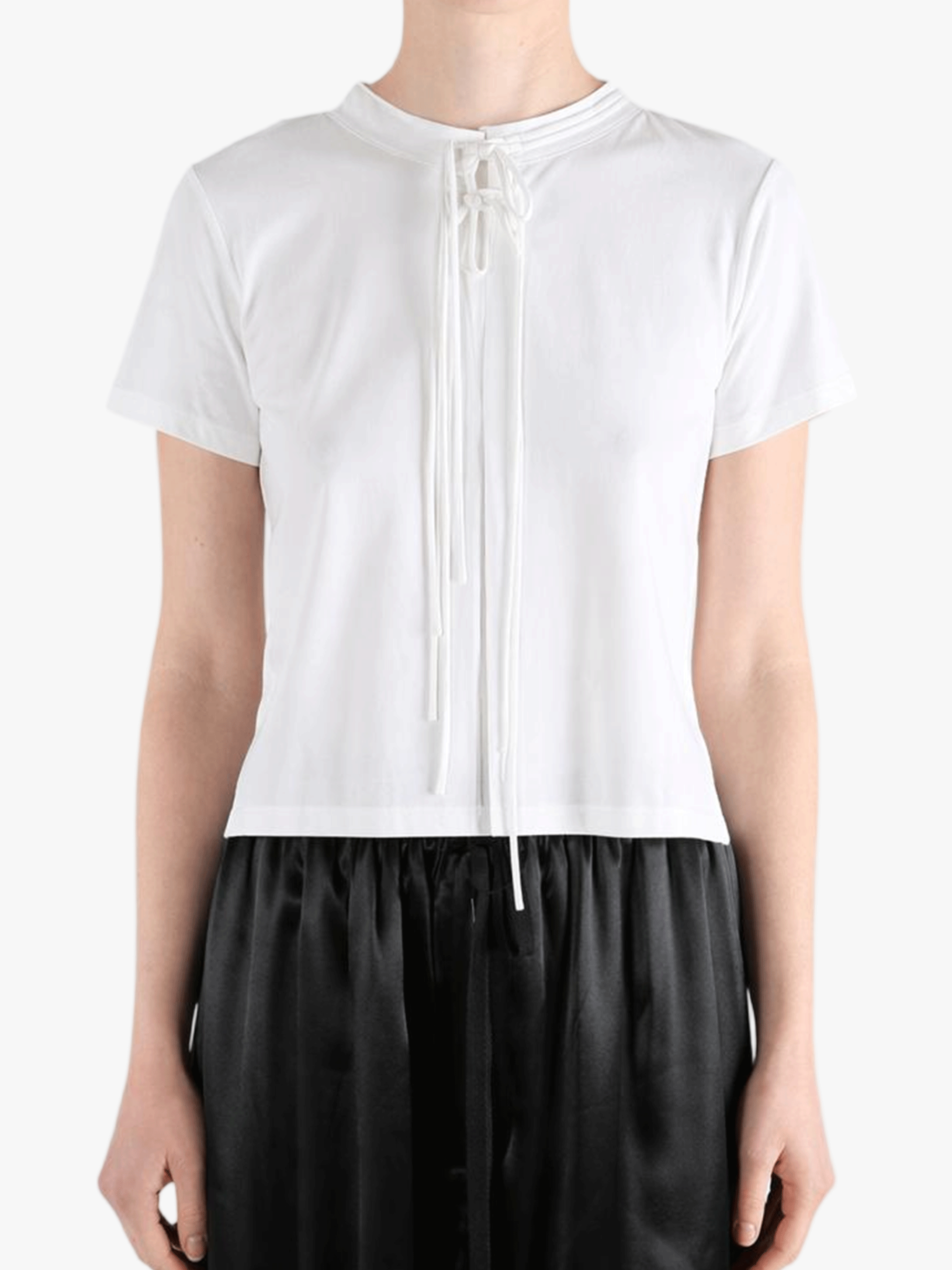 White shirts worn by a person, showing the shirts fit