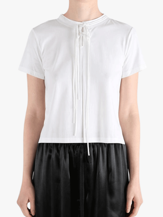 White shirts worn by a person, showing the shirts fit