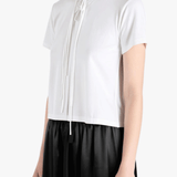 White shirts worn by a person, showing the shirts fit
