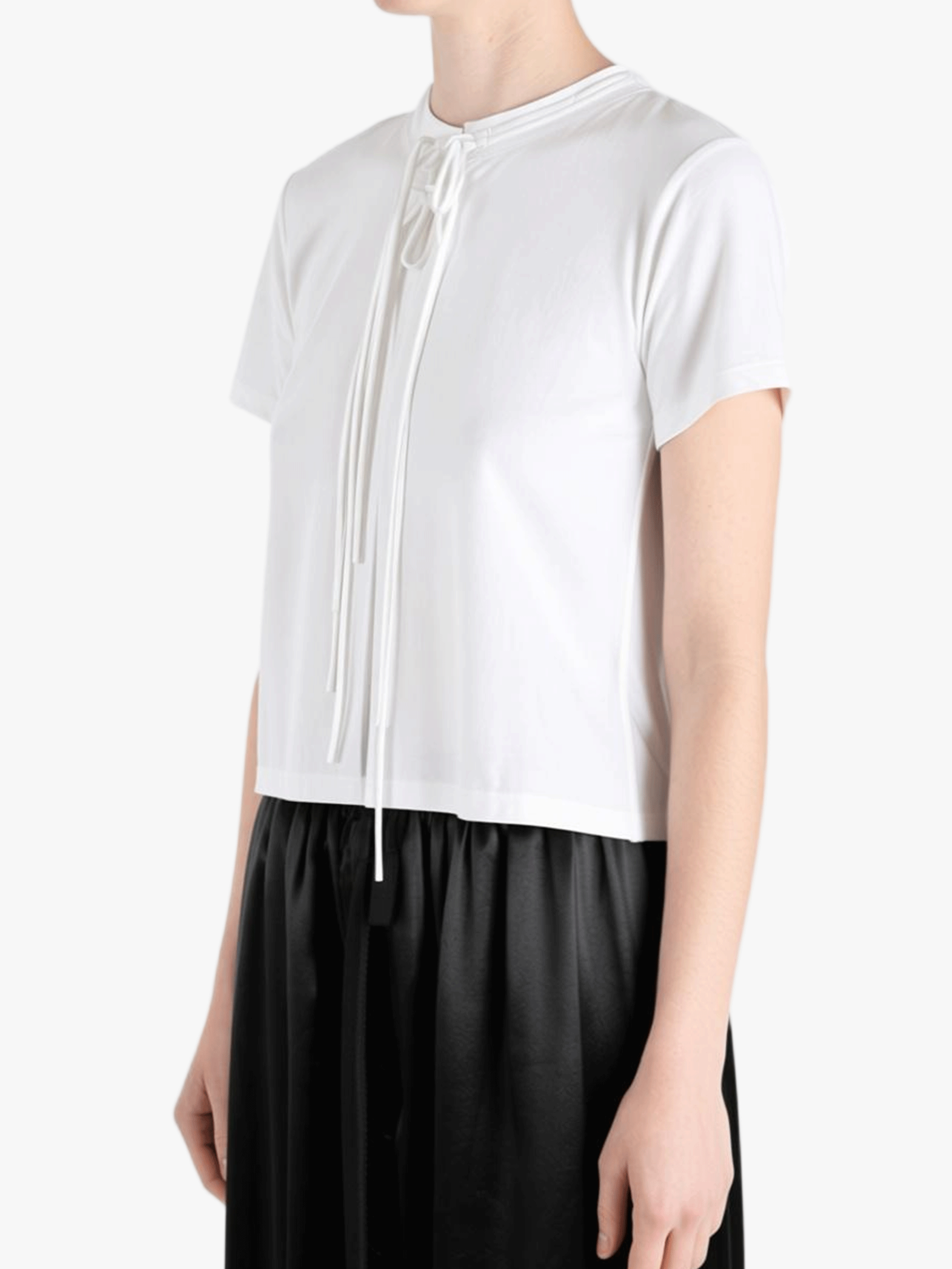 White shirts worn by a person, showing the shirts fit