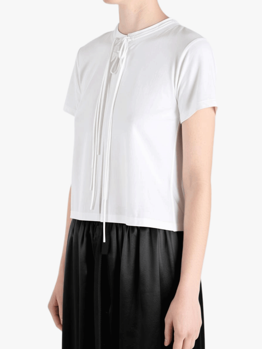 White shirts worn by a person, showing the shirts fit