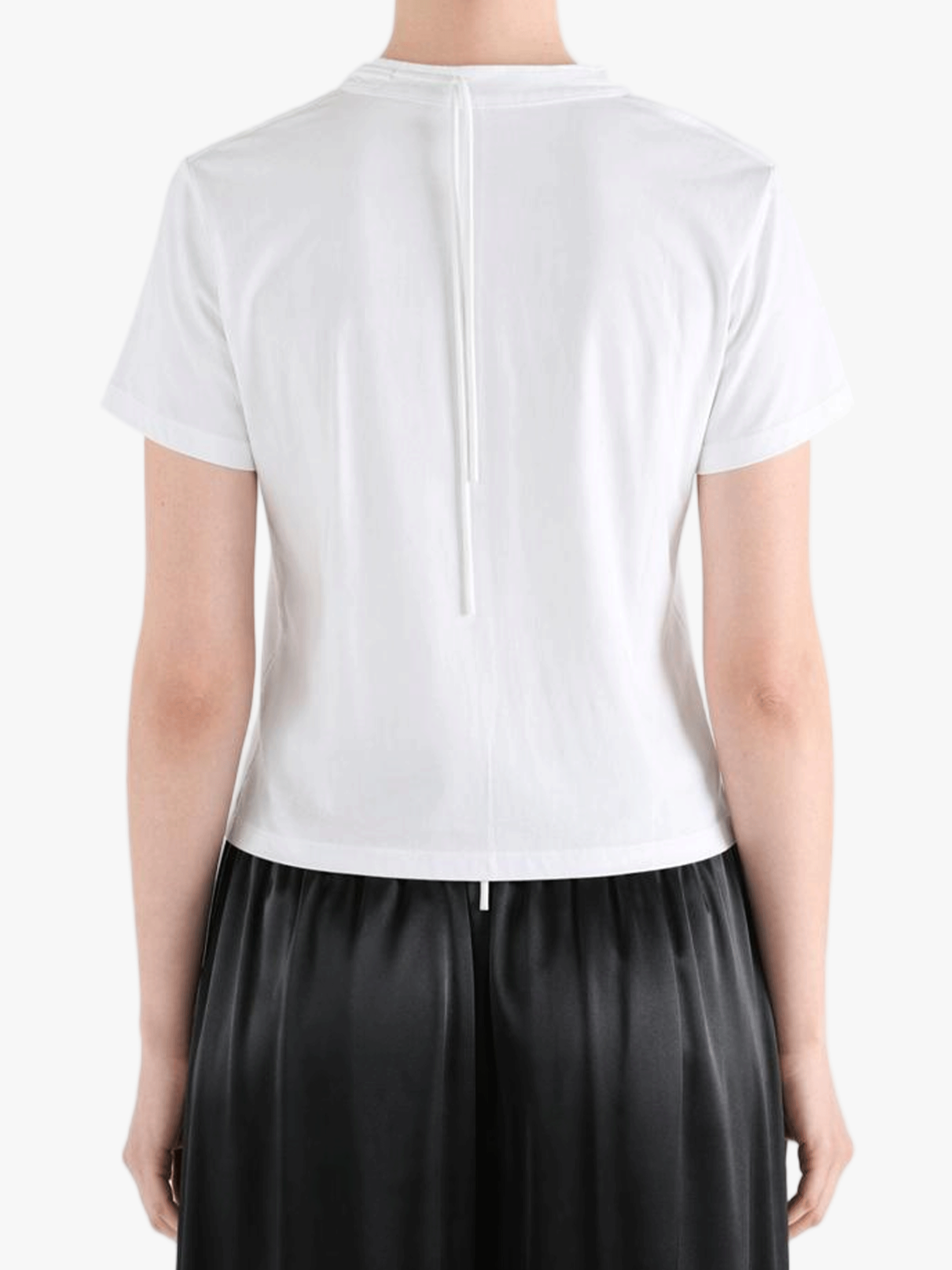 White shirts worn by a person, showing the shirts fit