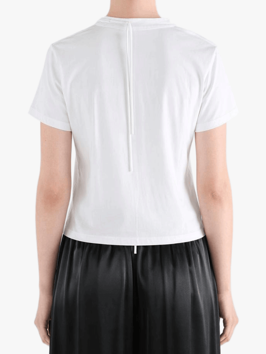 White shirts worn by a person, showing the shirts fit