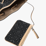 close up of black bags, showing texture of the Calf Leather  fabric