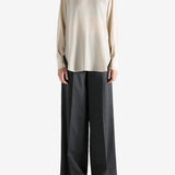 White top, full body view