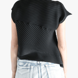 Black shirt worn by a person, showing the shirt's fit