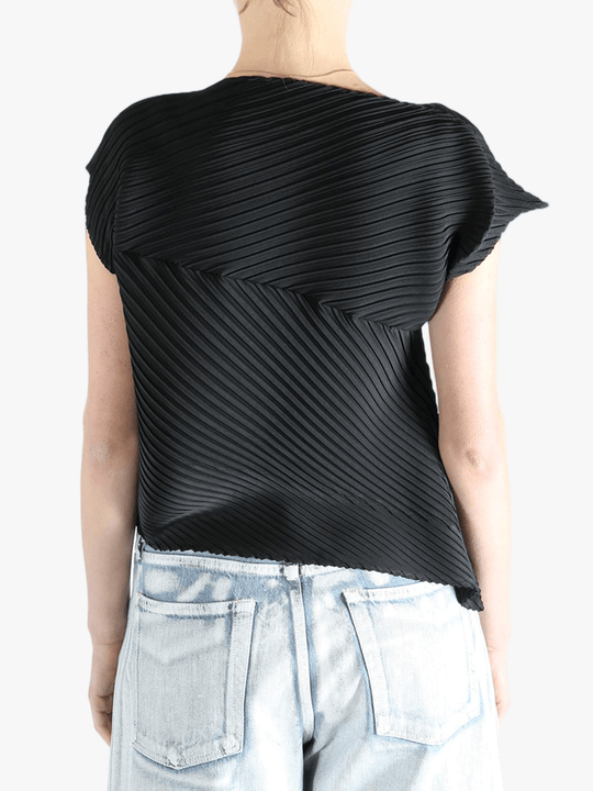 Black shirt worn by a person, showing the shirt's fit