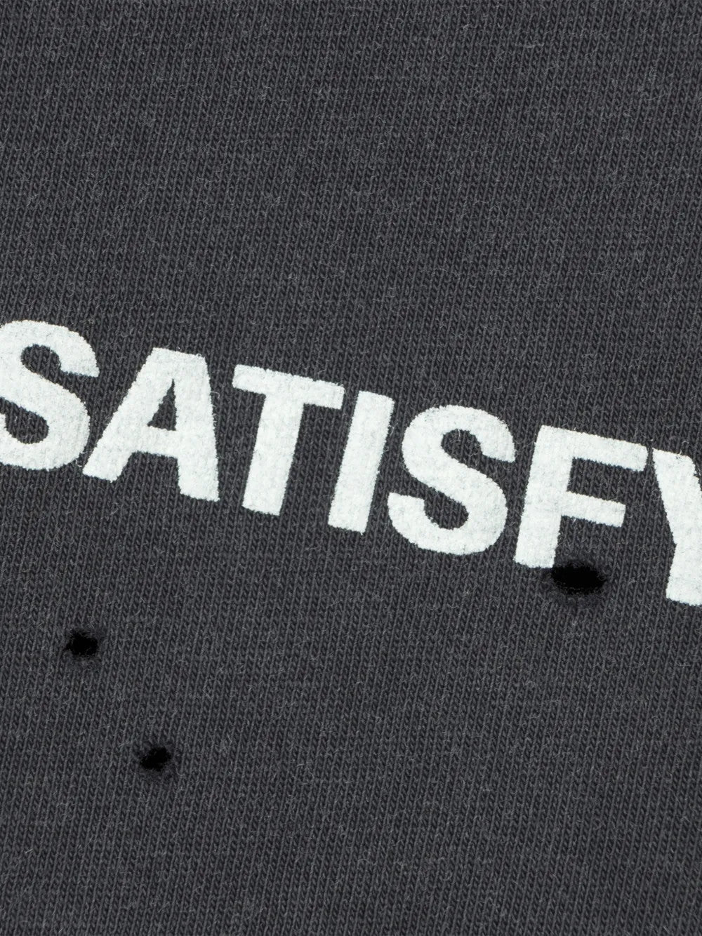 Close up of Black t-shirt, showing texture of the 100% organic cotton made fabric