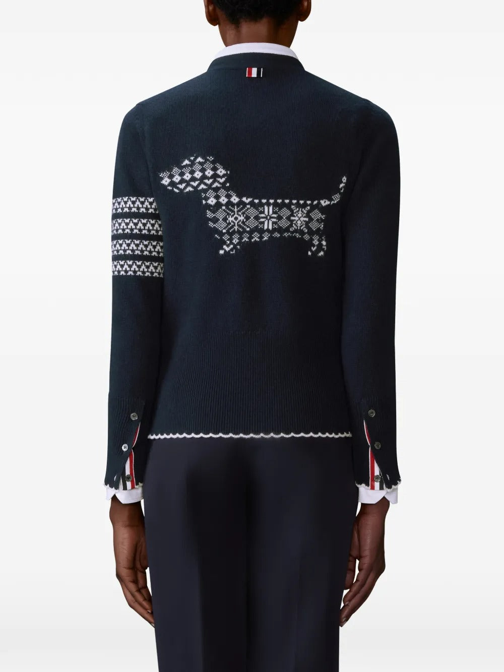 Navy cardigan worn by a person, showing the cardigan's fit